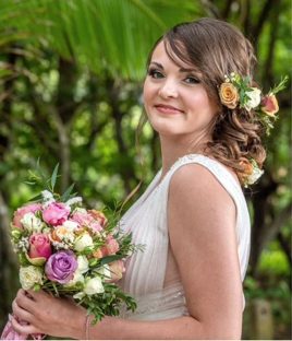 Bride with floral hair and bouquet